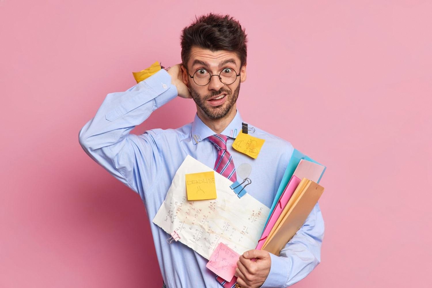 Overwhelmed manager with sticky notes showing stress and workload signals a leadership assessment can measure